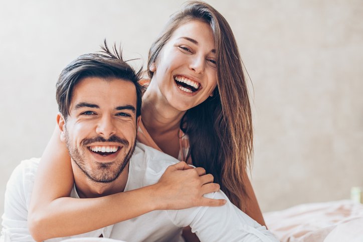 routine general dental care in belmont sutton couple smiling laughing together