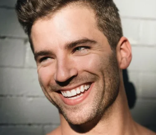 dental implants in belmont sutton man smiling white smile