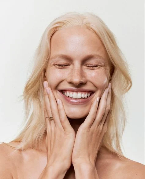 woman smiling white teeth dental implants in belmont sutton